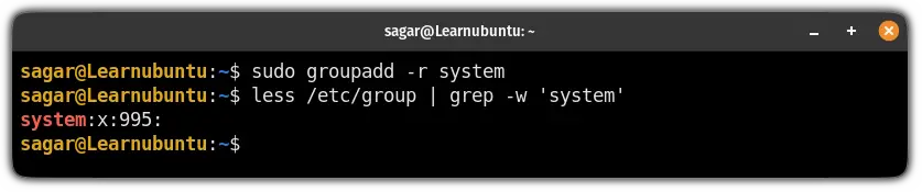 create a system group using the groupadd command